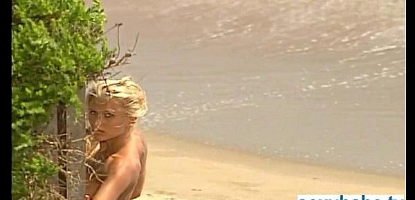  Stunning tanned bikini blonde nude at beach